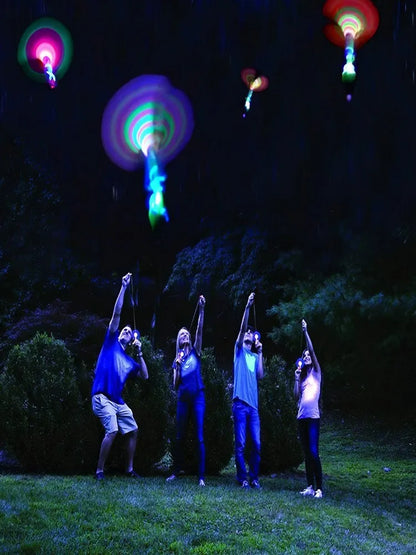 LED Flash Rocket Slingshot Toy | Flying Helicopter Glow Party Gift